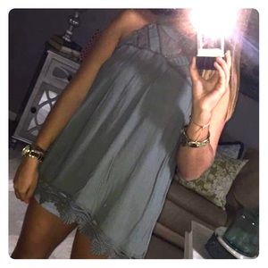 green halter-style tank top